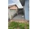Yard includes a metal gate, providing privacy and access at 1740 W Crescent Ave, Mesa, AZ 85202