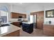 Modern kitchen with stainless steel appliances, granite countertops, and a center island at 18014 N 53Rd Pl, Scottsdale, AZ 85254