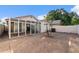 Low maintenance backyard with stone landscaping and an enclosed sun room at 1836 N Stapley Dr # 4, Mesa, AZ 85203
