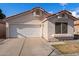Charming single-story home with a two-car garage, red tile roof, and well-maintained landscaping at 1836 N Stapley Dr # 4, Mesa, AZ 85203
