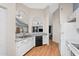 Inviting eat-in kitchen with breakfast bar and a view into the living room at 1836 N Stapley Dr # 4, Mesa, AZ 85203