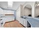 Well-lit kitchen features generous counter space, white cabinets, and a convenient skylight for natural lighting at 1836 N Stapley Dr # 4, Mesa, AZ 85203