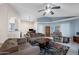 Spacious living room features tile floors, large windows, vaulted ceilings, and comfortable seating area at 1836 N Stapley Dr # 4, Mesa, AZ 85203