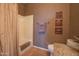 Bathroom showcases neutral tile, framed mirror, granite vanity top and shower with curtains at 19700 N 76Th St # 2001, Scottsdale, AZ 85255