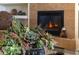 Close-up of elegant fireplace and decorative succulent arrangement at 19700 N 76Th St # 2001, Scottsdale, AZ 85255