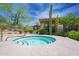 Relaxing hot tub offers a secluded spot, surrounded by beautiful greenery and desert landscaping at 19700 N 76Th St # 2001, Scottsdale, AZ 85255