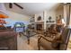 Cozy living area showcases a fireplace, built-in shelves, and sophisticated furniture for relaxed living at 19700 N 76Th St # 2001, Scottsdale, AZ 85255