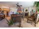 Spacious living room with fireplace, comfortable seating, and decorative elements at 19700 N 76Th St # 2001, Scottsdale, AZ 85255