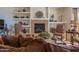 Inviting living room with fireplace, elegant decor, and comfortable seating arrangements at 19700 N 76Th St # 2001, Scottsdale, AZ 85255