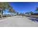 Outdoor basketball court surrounded by mature trees and green spaces, perfect for recreation at 20338 N 262Nd Ave, Buckeye, AZ 85396
