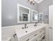 Elegant bathroom with double vanity, decorative mirrors, and ample counter space at 20338 N 262Nd Ave, Buckeye, AZ 85396