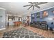Spacious bonus room with a pool table, seating area, and ample space for various activities at 20338 N 262Nd Ave, Buckeye, AZ 85396