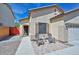 Beautiful home with a cozy entrance featuring comfortable seating and an inviting front walkway at 20338 N 262Nd Ave, Buckeye, AZ 85396