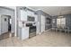 Well-equipped kitchen featuring stainless steel appliances, granite countertops, and an adjacent dining area at 20338 N 262Nd Ave, Buckeye, AZ 85396