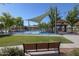 Gathering-friendly splash pad with seating, shaded structures and play areas for and families at 20338 N 262Nd Ave, Buckeye, AZ 85396