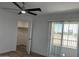 A bedroom featuring a view from a sliding glass door and a closet at 225 N Pomeroy -- # 16, Mesa, AZ 85201