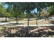 Community park featuring walking paths and mature trees at 225 N Pomeroy -- # 16, Mesa, AZ 85201