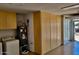 Garage featuring cabinets, washer, and water heater at 225 N Pomeroy -- # 16, Mesa, AZ 85201