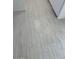Neutral-toned tile floor in a modern kitchen, adding a touch of elegance at 225 N Pomeroy -- # 16, Mesa, AZ 85201