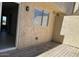 An inviting patio with a window, ideal for enjoying outdoor living and relaxation at 225 N Pomeroy -- # 16, Mesa, AZ 85201