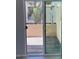 Sliding glass doors open to a private outdoor patio at 225 N Pomeroy -- # 16, Mesa, AZ 85201