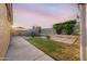 Nice backyard with a wooden playset, patio, and grassy area, great for  at 23932 W Hidalgo Ave, Buckeye, AZ 85326