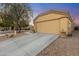 Inviting home with a two-car garage and low maintenance desert landscaping and a fire hydrant at 23932 W Hidalgo Ave, Buckeye, AZ 85326