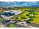 Aerial view of the community center complete with a modern design and a well landscaped park at 24066 N 167Th Ln, Surprise, AZ 85387