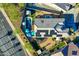 Property featuring a well-maintained backyard with a pool, patio area, and energy-efficient solar panels at 24066 N 167Th Ln, Surprise, AZ 85387
