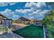 Fully fenced backyard with shed and grassy area featuring beautiful landscaping at 24066 N 167Th Ln, Surprise, AZ 85387