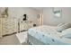 Cozy bedroom with stylish furniture, soft carpet, and plenty of natural light at 24066 N 167Th Ln, Surprise, AZ 85387
