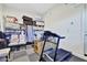 Versatile bonus room featuring ample storage, and plenty of room for a treadmill at 24066 N 167Th Ln, Surprise, AZ 85387