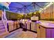Well-equipped outdoor kitchen with stainless steel appliances, ideal for al fresco dining and entertaining at 24066 N 167Th Ln, Surprise, AZ 85387