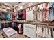Spacious walk-in closet with custom shelving and ample storage at 24066 N 167Th Ln, Surprise, AZ 85387