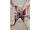 Organized walk-in closet with shelves, hanging rods, and storage for accessories at 24066 N 167Th Ln, Surprise, AZ 85387