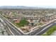 An aerial view of the community showcasing a baseball field, ponds and neatly organized homes at 2850 N 152Nd Ln, Goodyear, AZ 85395