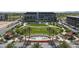 Aerial shot of the Goodyear sign and a large community space with palm trees and lawns at 2850 N 152Nd Ln, Goodyear, AZ 85395