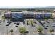 Exterior view of Harkins Theatre, showcasing ample parking and modern architecture at 2850 N 152Nd Ln, Goodyear, AZ 85395