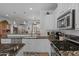 Updated kitchen features modern appliances, granite countertops, and abundant cabinet space at 31106 N 130Th Ln, Peoria, AZ 85383
