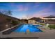 An inviting backyard pool and spa offer the perfect setting for relaxation and entertaining with lush landscaping at 31106 N 130Th Ln, Peoria, AZ 85383