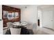 Cozy dining area featuring a brick accent wall and a modern round table with stylish seating at 3302 N 7Th St # 211, Phoenix, AZ 85014