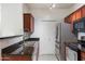 Modern kitchen with stainless steel appliances, sleek cabinetry, and efficient lighting for a contemporary feel at 3302 N 7Th St # 211, Phoenix, AZ 85014
