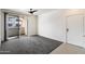 Spacious living room leading to a private balcony, perfect for relaxation and enjoying outdoor views at 3302 N 7Th St # 211, Phoenix, AZ 85014