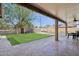 Backyard features pool, grass, a covered patio, and a brick wall at 3830 E Desert Cove Ave, Phoenix, AZ 85028