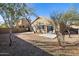 Spacious backyard featuring two houses and a patio area at 4031 E Barwick Dr, Cave Creek, AZ 85331