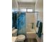 Well-lit bathroom with a blue shower curtain and modern fixtures at 4031 E Barwick Dr, Cave Creek, AZ 85331