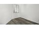 This bedroom features wood-look flooring and a bright window at 4031 E Barwick Dr, Cave Creek, AZ 85331