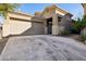 Charming single-story home with desert landscaping, a two-car garage, and a covered front entry at 4031 E Barwick Dr, Cave Creek, AZ 85331