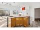 Open kitchen with light wood cabinets, a breakfast bar, and stainless steel appliances at 4031 E Barwick Dr, Cave Creek, AZ 85331