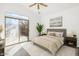 Stylish main bedroom featuring a large window, vaulted ceiling and neutral color scheme at 4031 E Barwick Dr, Cave Creek, AZ 85331